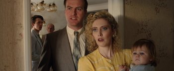 Movie still from “Pride” (2014), directed by Matthew Warchus – A man and a woman standing next to each other; Close Up shot, Low angle