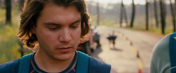 Movie still from “Prince Avalanche” (2013), directed by David Gordon Green – A person with long brown hair; Close Up shot, Over the shoulder angle