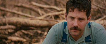 Movie still from “Prince Avalanche” (2013), directed by David Gordon Green – A person with a mustache; Close Up shot, Over the shoulder angle