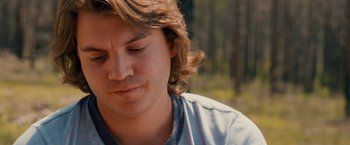 Movie still from “Prince Avalanche” (2013), directed by David Gordon Green – A person with long hair; Close Up shot, Over the shoulder angle