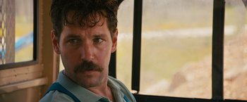 Movie still from “Prince Avalanche” (2013), directed by David Gordon Green – A person with a mustache; Close Up shot, Over the shoulder angle