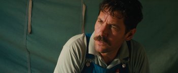 Movie still from “Prince Avalanche” (2013), directed by David Gordon Green – A person with a mustache; Close Up shot, Low angle