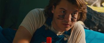 Movie still from “Prince Avalanche” (2013), directed by David Gordon Green – A man with a face paint on his face; Close Up shot, Low angle