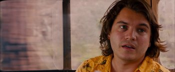 Movie still from “Prince Avalanche” (2013), directed by David Gordon Green – A person wearing a yellow shirt; Close Up shot, Over the shoulder angle