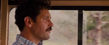 Movie still from “Prince Avalanche” (2013), directed by David Gordon Green – A person with a mustache; Close Up shot, Low angle