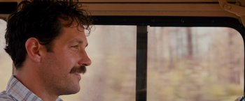 Movie still from “Prince Avalanche” (2013), directed by David Gordon Green – A person with a beard and mustache; Close Up shot, Over the shoulder angle
