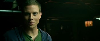 Movie still from “Project Almanac” (2015), directed by Dean Israelite – A young man is smiling for the camera; Close Up shot, Low angle