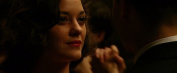 Movie still from “Public Enemies” (2009), directed by Michael Mann – A person with a hair brush; Close Up shot, Over the shoulder angle