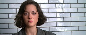 Movie still from “Public Enemies” (2009), directed by Michael Mann – A person with short hair; Close Up shot, Over the shoulder angle