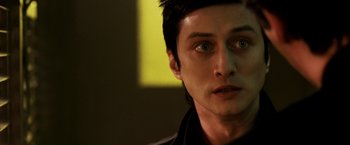 Movie still from “Punisher: War Zone” (2008), directed by Lexi Alexander – A person wearing a black shirt; Close Up shot, Low angle