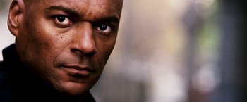 Movie still from “Punisher: War Zone” (2008), directed by Lexi Alexander – A man's face with his eyes wide open; Close Up shot, Low angle