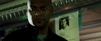 Movie still from “Punisher: War Zone” (2008), directed by Lexi Alexander – A person wearing a black jacket; Close Up shot, Low angle