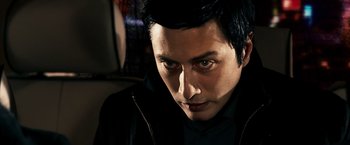 Movie still from “Punisher: War Zone” (2008), directed by Lexi Alexander – A person wearing a black jacket; Close Up shot, High angle