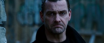 Movie still from “Punisher: War Zone” (2008), directed by Lexi Alexander – A person wearing a black jacket; Close Up shot, Low angle