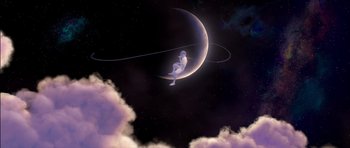 Movie still from “Puss in Boots” (2011), directed by Chris Miller – An illustration of a person sitting on a crescent moon; Extreme Wide shot, Low angle