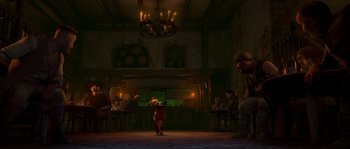 Movie still from “Puss in Boots” (2011), directed by Chris Miller – A group of people sitting around a room; Wide shot, Low angle