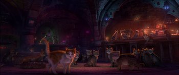 Movie still from “Puss in Boots” (2011), directed by Chris Miller – A group of cats sitting on top of a floor; Wide shot, High angle