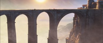 Movie still from “Puss in Boots” (2011), directed by Chris Miller – A view of a bridge that is going over a mountain; Extreme Wide shot, Low angle