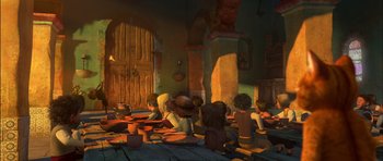 Movie still from “Puss in Boots” (2011), directed by Chris Miller – A group of people sitting around a table with plates; Wide shot, Over the shoulder angle