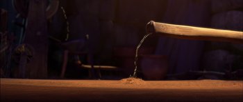 Movie still from “Puss in Boots” (2011), directed by Chris Miller – A hammer hitting a piece of wood on top of a table; Extreme Close Up shot, High angle