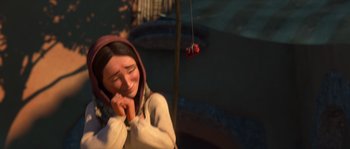 Movie still from “Puss in Boots” (2011), directed by Chris Miller – An animated woman is talking on a cell phone; Medium shot, Low angle