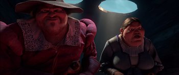 Movie still from “Puss in Boots” (2011), directed by Chris Miller – A man and a woman sitting next to each other; Medium shot, Over the shoulder angle