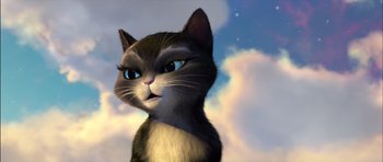 Movie still from “Puss in Boots” (2011), directed by Chris Miller – A cartoon cat with a sky background in the background; Close Up shot, Low angle