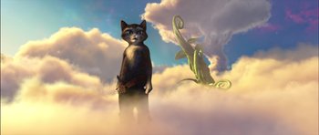 Movie still from “Puss in Boots” (2011), directed by Chris Miller – A cat standing in the clouds next to a plant; Wide shot, Low angle