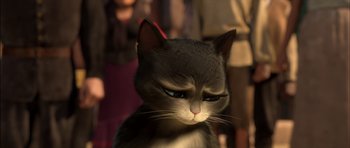 Movie still from “Puss in Boots” (2011), directed by Chris Miller – A gray cat with blue eyes is looking at the camera; Close Up shot, Low angle