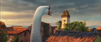 Movie still from “Puss in Boots” (2011), directed by Chris Miller – A large white swan standing on top of a roof; Extreme Wide shot, Low angle