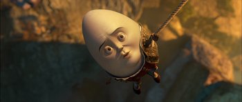 Movie still from “Puss in Boots” (2011), directed by Chris Miller – An egg head is hanging from a rope; Close Up shot, Low angle