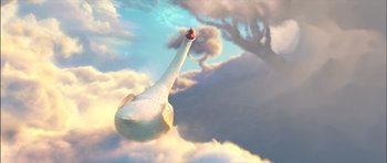 Movie still from “Puss in Boots” (2011), directed by Chris Miller – An illustration of an airplane flying through the clouds; Wide shot, Low angle