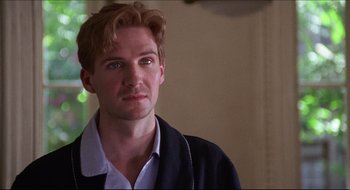 Movie still from “Quiz Show” (1994), directed by Robert Redford – A person wearing a shirt and jacket; Close Up shot, Over the shoulder angle