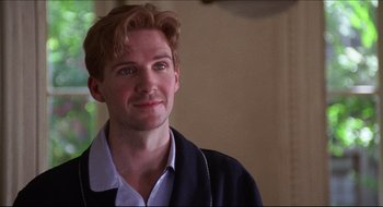 Movie still from “Quiz Show” (1994), directed by Robert Redford – A person wearing a jacket; Close Up shot, Over the shoulder angle