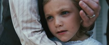 Movie still from “Reaching for the Moon” (2013), directed by Bruno Barreto – A young girl's face; Close Up shot, High angle