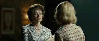 Movie still from “Reaching for the Moon” (2013), directed by Bruno Barreto – Two women are talking in front of a mirror; Close Up shot, Over the shoulder angle