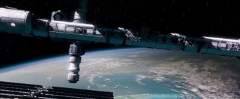 Movie still from “Red Planet” (2000), directed by Antony Hoffman – An image of a space station in the middle of the earth; Extreme Wide shot, Overhead angle