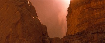 Movie still from “Red Planet” (2000), directed by Antony Hoffman – A view of a mountain from the ground; Extreme Wide shot, Low angle