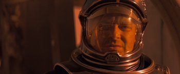 Movie still from “Red Planet” (2000), directed by Antony Hoffman – A person wearing a space suit; Close Up shot, Low angle