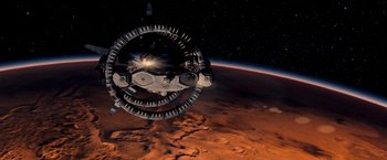 Movie still from “Red Planet” (2000), directed by Antony Hoffman – An image of a space station in the middle of the earth; Extreme Wide shot, High angle