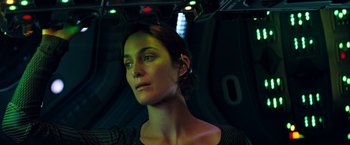 Movie still from “Red Planet” (2000), directed by Antony Hoffman – A person wearing a black shirt; Close Up shot, Overhead angle