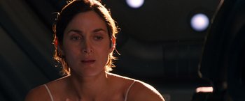 Movie still from “Red Planet” (2000), directed by Antony Hoffman – A woman's face in the sunlight; Close Up shot, Over the shoulder angle