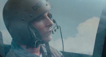 Movie still from “Rescue Dawn” (2006), directed by Werner Herzog – A person wearing a helmet; Close Up shot, High angle