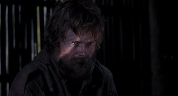 Movie still from “Rescue Dawn” (2006), directed by Werner Herzog – A person with a beard; Close Up shot, Over the shoulder angle
