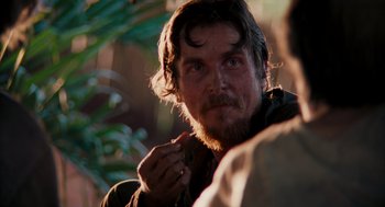 Movie still from “Rescue Dawn” (2006), directed by Werner Herzog – A person with a beard; Close Up shot, Over the shoulder angle