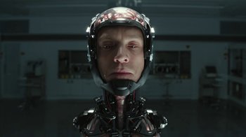 Movie still from “RoboCop” (2014), directed by José Padilha – A person wearing a helmet; Close Up shot, Low angle