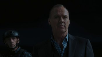 Movie still from “RoboCop” (2014), directed by José Padilha – A person wearing a suit and tie; Close Up shot, Low angle