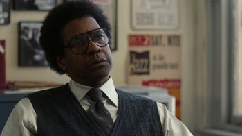 Movie still from “Roman J. Israel, Esq.” (2017), directed by Dan Gilroy – A man in a vest and tie looking to his left; Close Up shot, Low angle