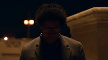 Movie still from “Roman J. Israel, Esq.” (2017), directed by Dan Gilroy – A man in a suit and tie with a beard; Close Up shot, Low angle
