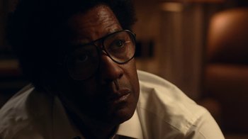 Movie still from “Roman J. Israel, Esq.” (2017), directed by Dan Gilroy – A person wearing a white shirt; Close Up shot, Over the shoulder angle